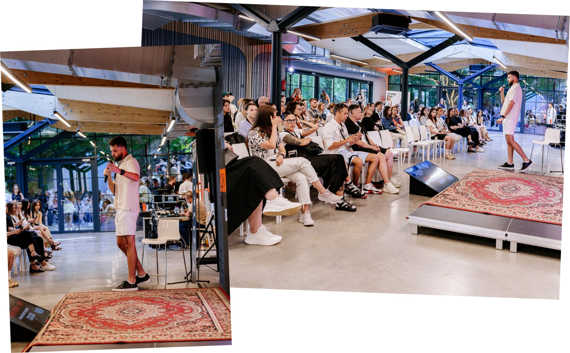 A man in white speaks at a presentation. An audience of many people watches him at an event space.